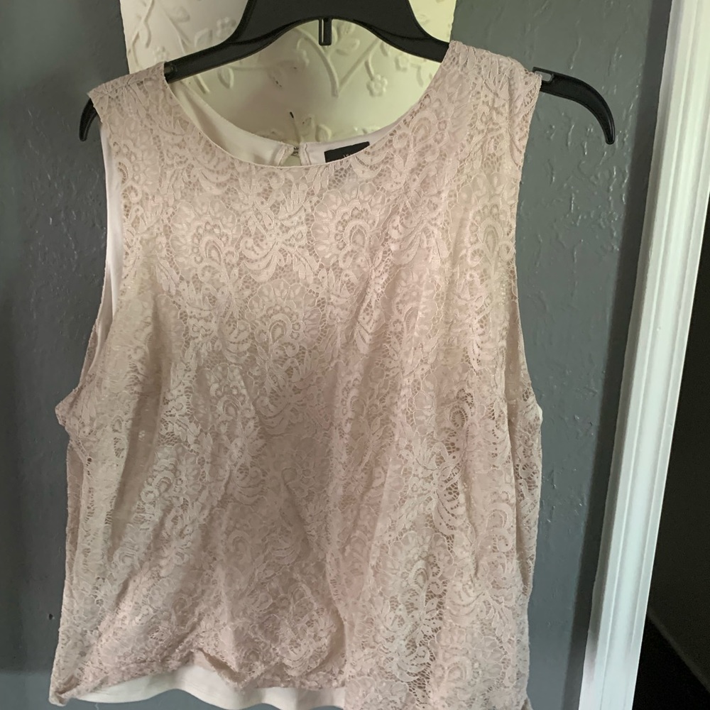 Lace top, looks good with a blazer